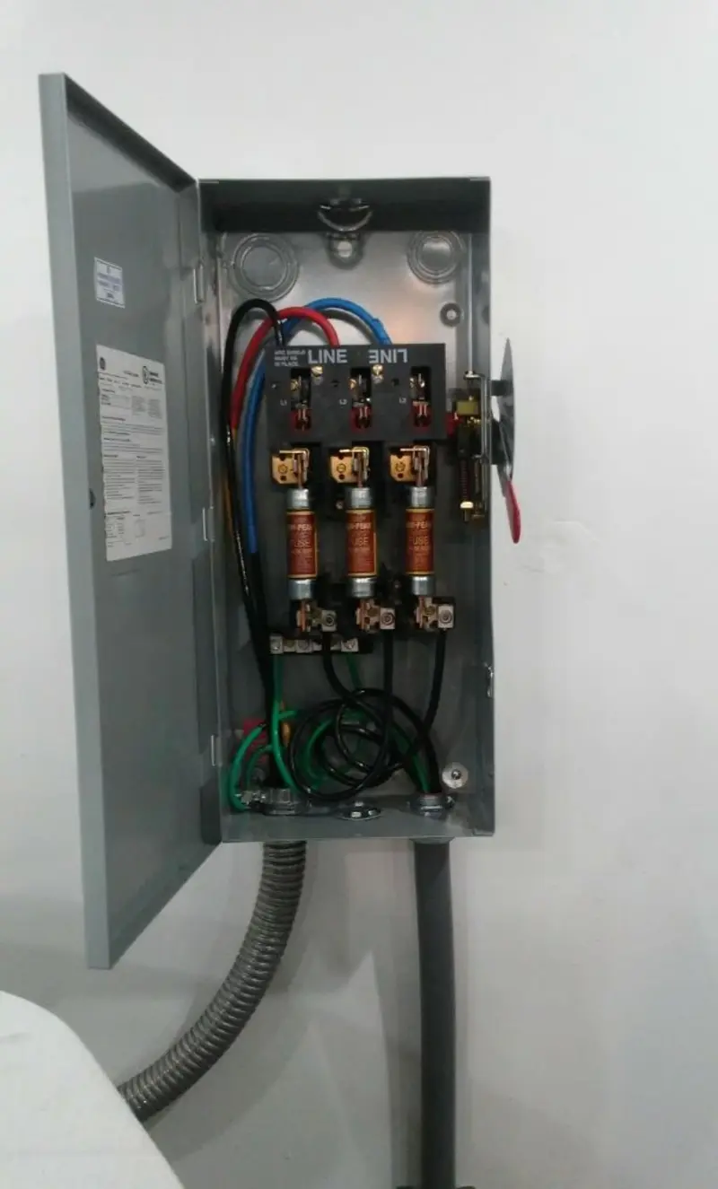 Three-phase disconnect switch installed for Smoke Detector Installation in Welsh